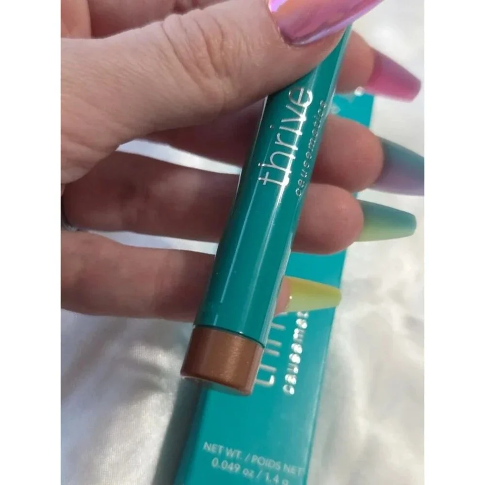 Thrive Brilliant Eye Brightener Stick - Pili (cool gold shimmer)